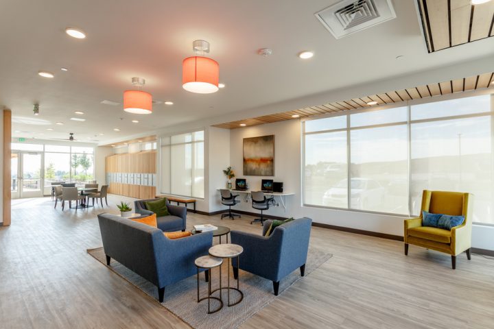Crossing Point North, Colorado affordable housing, lobby lounge area — VMWP