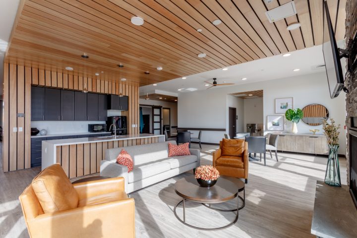 Crossing Point North, Colorado affordable housing, community lounge seating — VMWP
