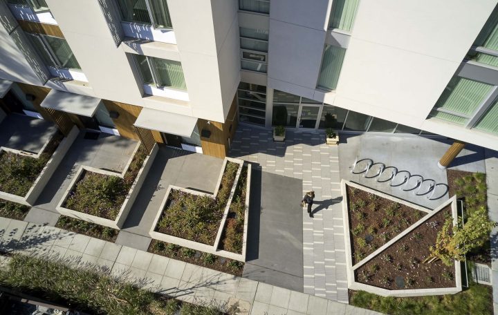 Eagle Park, veterans affordable housing, landscaped entry courtyard — Photography: Ken Gutmaker
