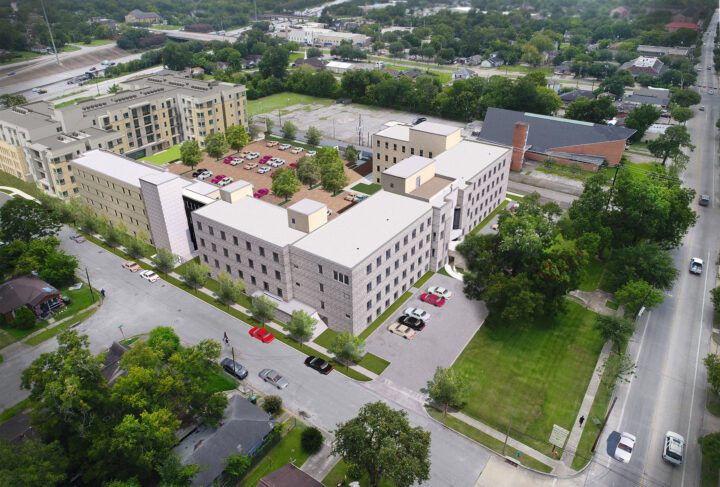 adaptive re-use hospital to affordable housing, aerial rendering — VMWP
