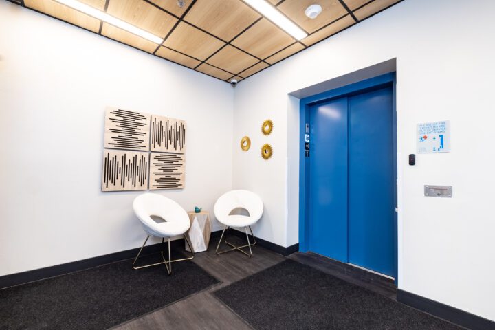 AVi at Olde Town, affordable housing architect, elevator lobby — VMWP