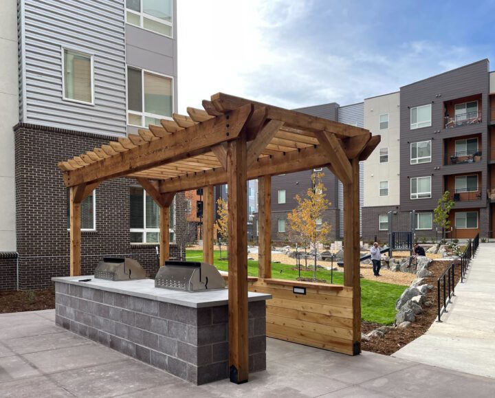 Crossing Pointe South, Colorado affordable housing, shaded courtyard pavilion — VMWP