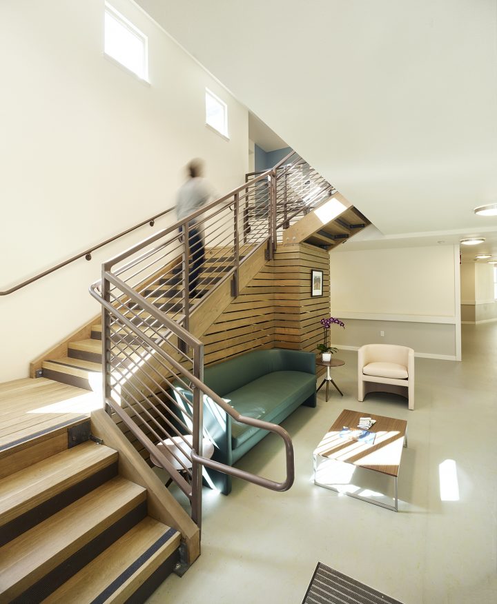 Victory Village, senior housing, central stairwell — VMWP