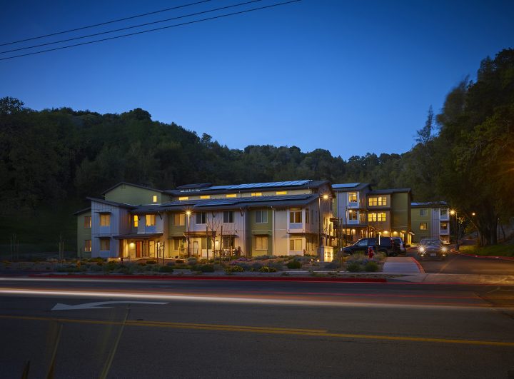 Victory Village, senior housing, evening street facade — VMWP