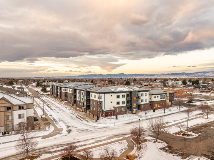 VMWP-Ascent_on_Hover-affordable_housing with childcare ECE aerial snow covered — Photography: Matt Staver