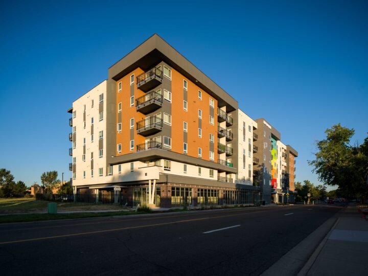 Affordable Housing Atop Mixed-Use Community Montbello FreshLo Hub Denver dusk — Image: Matt Staver