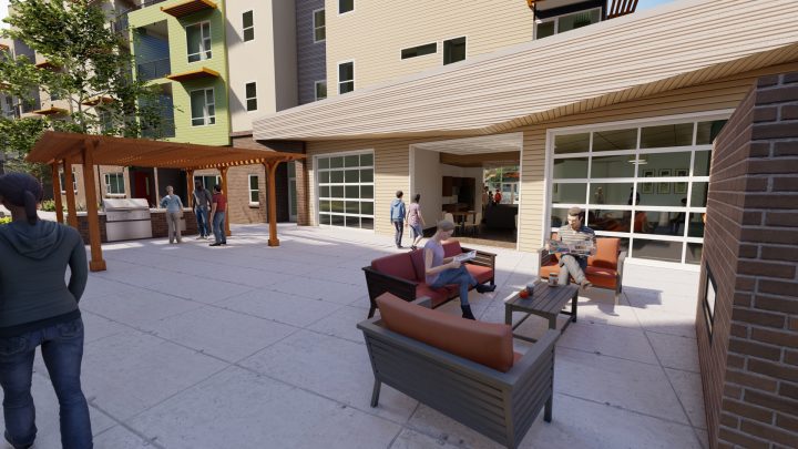 Crossing Pointe South, Colorado affordable housing, covered courtyard seating — VMWP