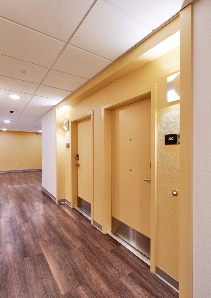 VMWP adaptive reuse, office conversion, Casa Canal, yellow hallway — Photo Credit: Keith Baker