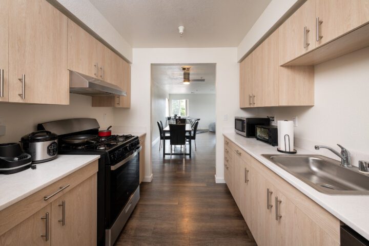 VMWP Nugent Square affordable housing apartment renovation kitchen — Image: Vantage Point Photography