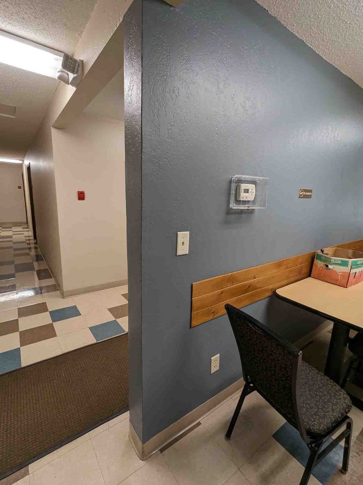 BEFORE Maple Hills Apartments Renovation Minneapolis lobby hallway — Image: VMWP