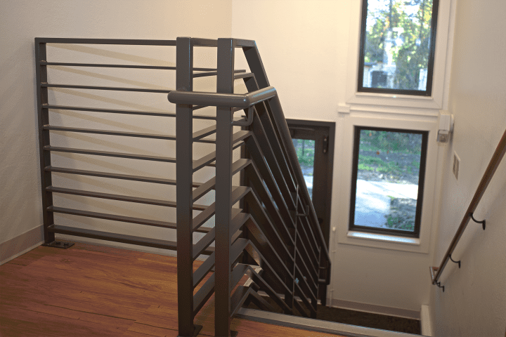Maple Hills Apartments Renovation Minneapolis stair — Image: VMWP