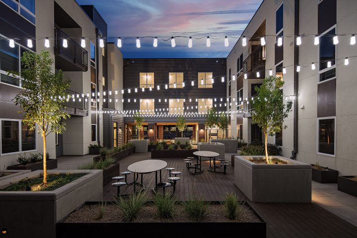 3210 Shoshone, affordable housing architect, courtyard at dusk — VMWP