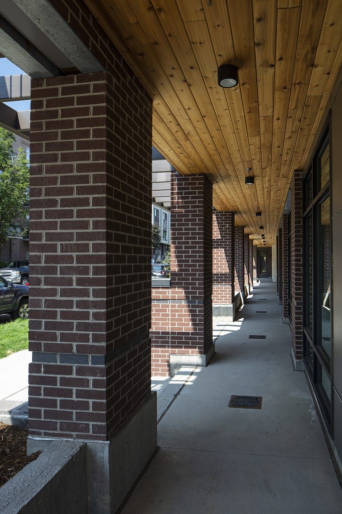 3210 Shoshone, affordable housing architect, covered exterior walkway — VMWP