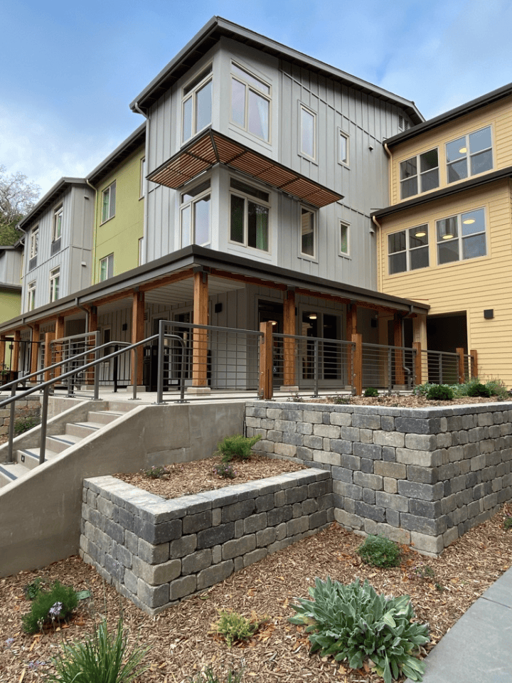 Victory Village, senior housing, corner entry terrace — VMWP